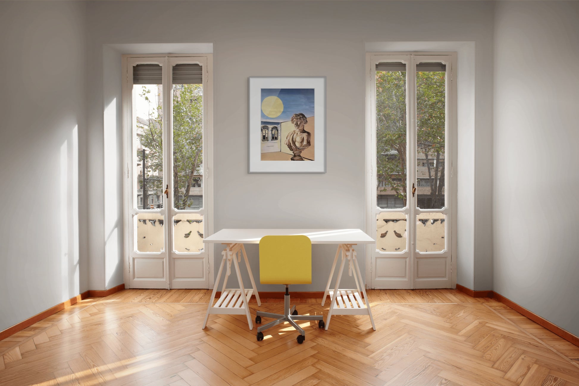 A framed painting of a Roman bust hangs in an empty room with French doors and parquet floors.