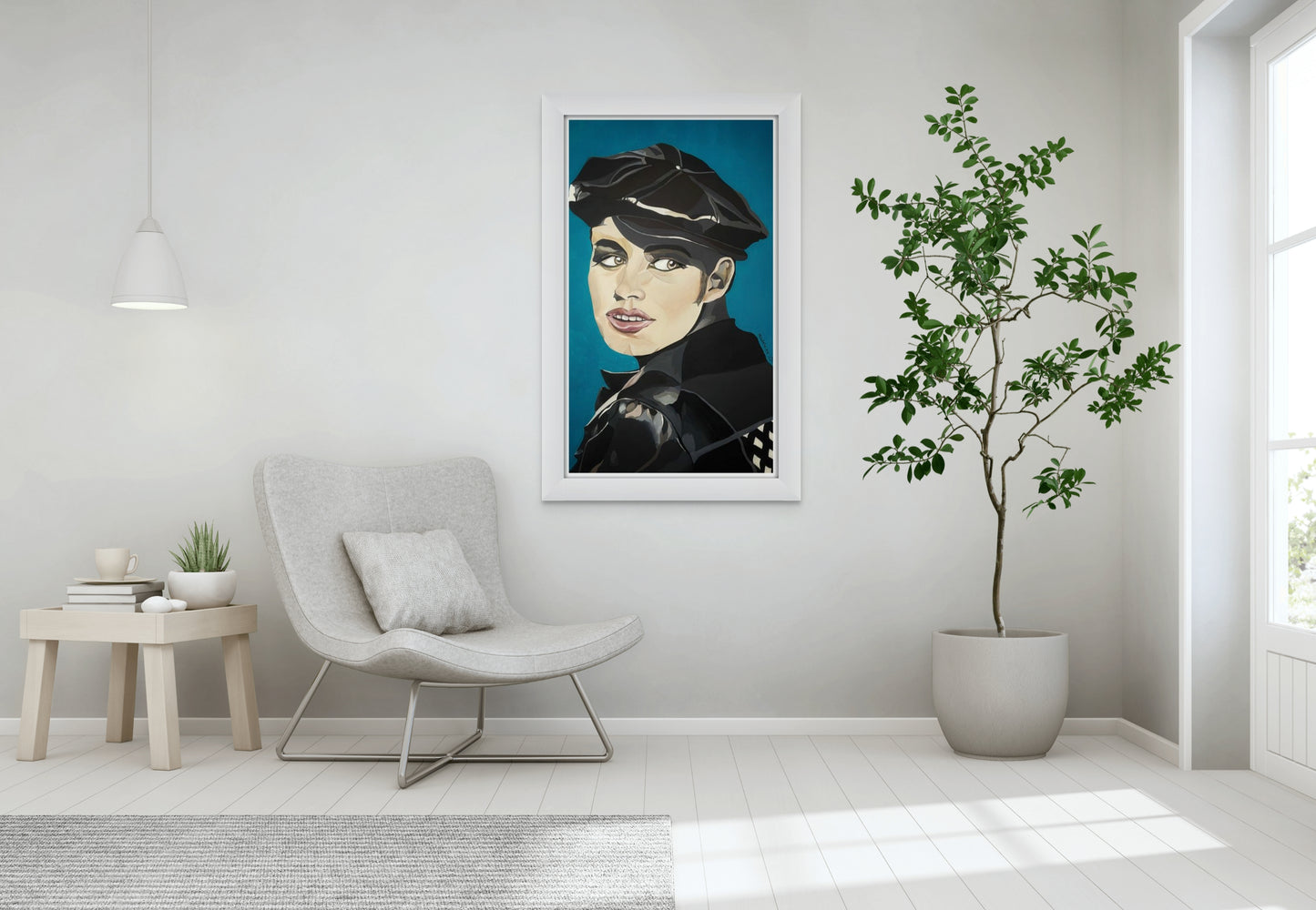 Portrait painting of a woman wearing a black leather beret and jacket hangs above a modern white chair. 