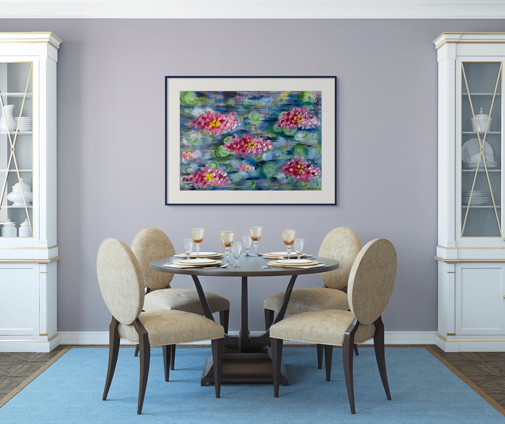 A framed painting of pink lilies in a pond hanging in a traditional dining room.