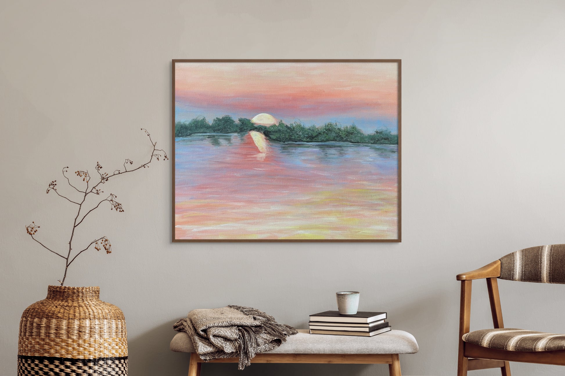 Painting of the Zambezi River at sunset hanging over a wooden bench.